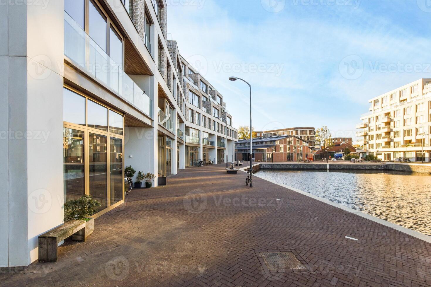 A canal with a building in the background photo