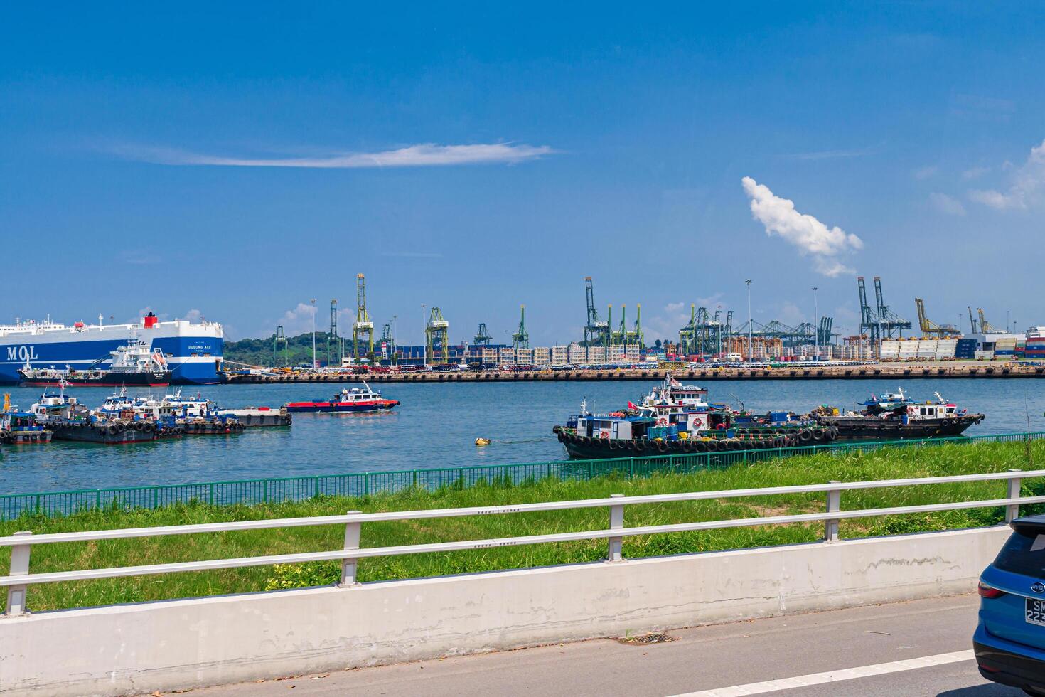 Singapore - Jun 13 2024 Aerial view of container terminal, cranes and container ships, Singapore, Southeast Asia photo
