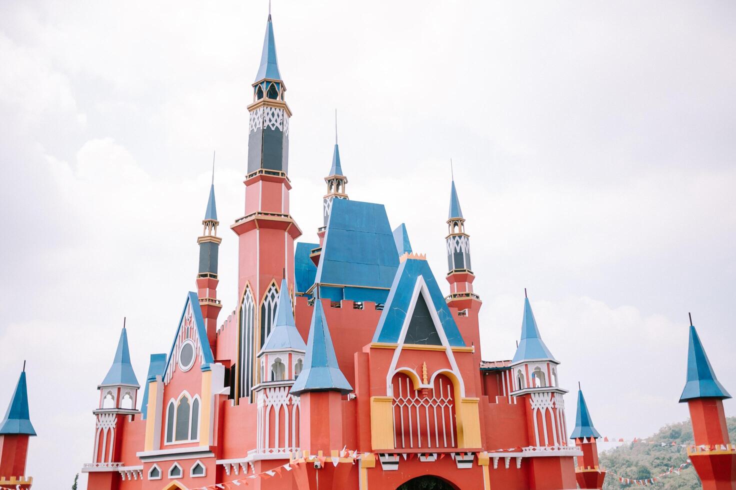 Lembang, September 2 2024. A grand castle resembling Disneyland, with towering spires and intricate details, photo