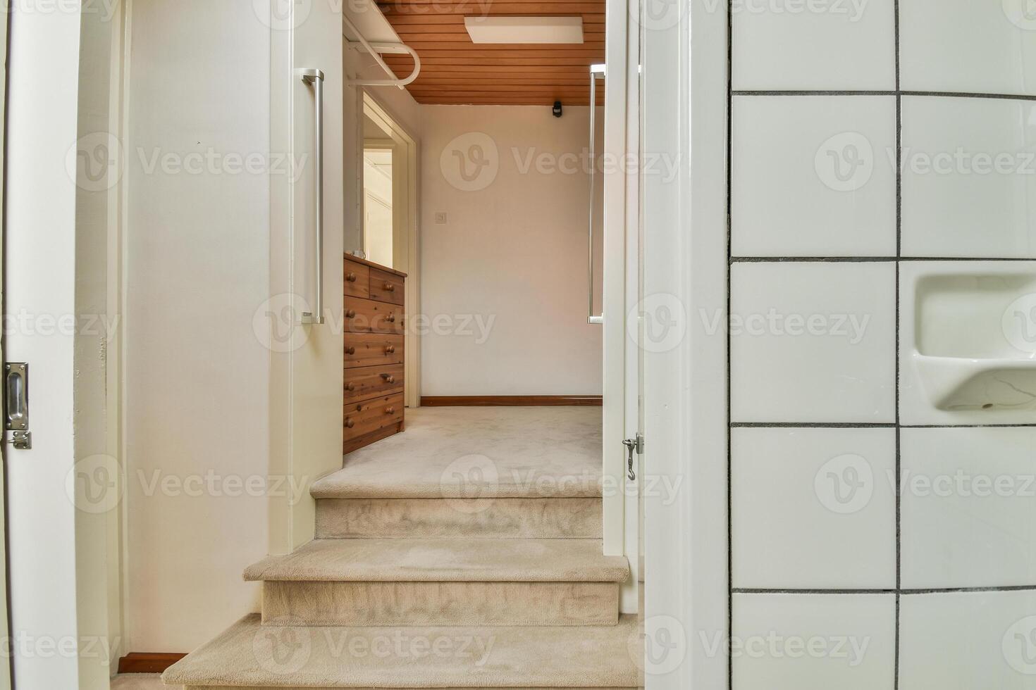 A bathroom with a toilet and a shower photo