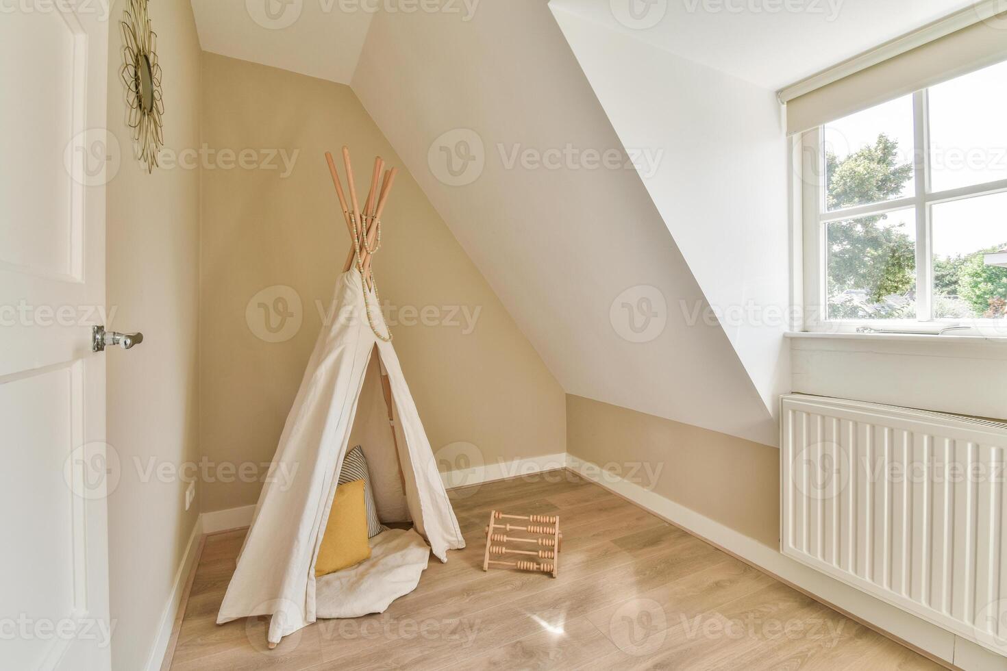 A teepee in a small room with a window photo