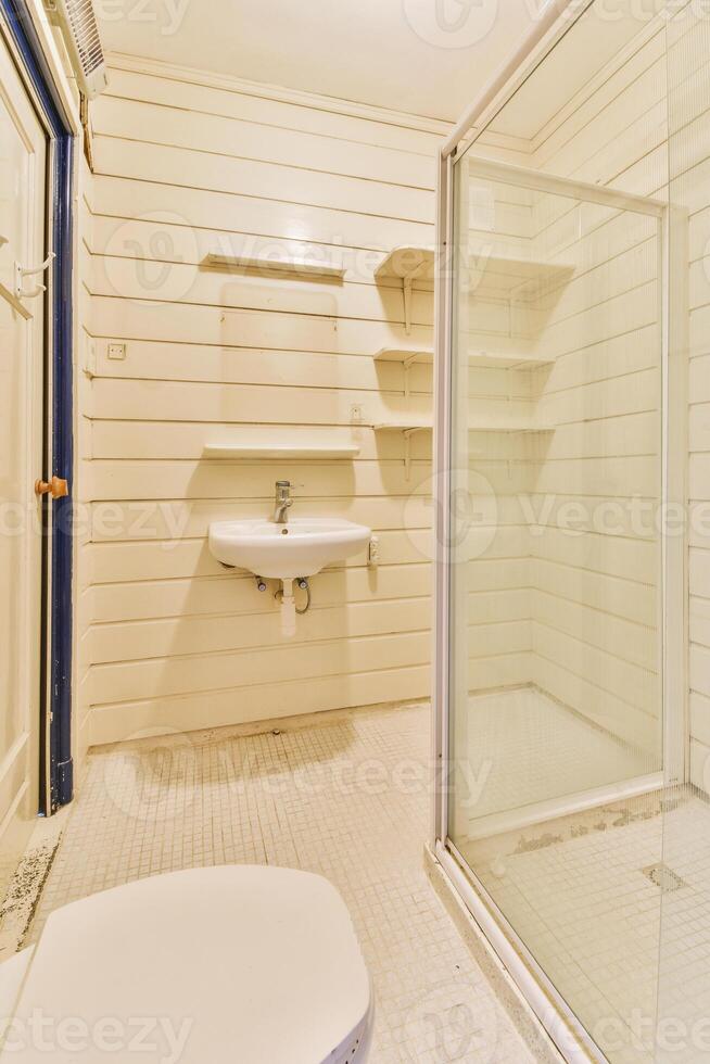 A bathroom with a shower and a sink photo