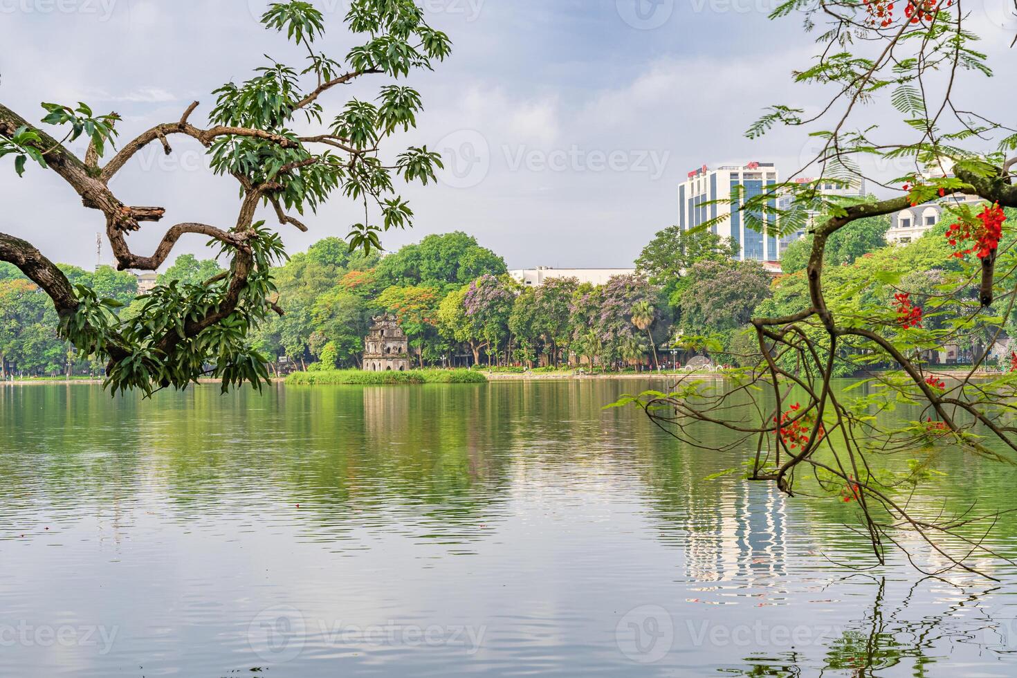 Hanoi, Vietnam - 26 June 2024 Turtle Tower Thap Rua in Hoan Kiem lake Sword lake, Ho Guom in Hanoi, Vietnam. photo