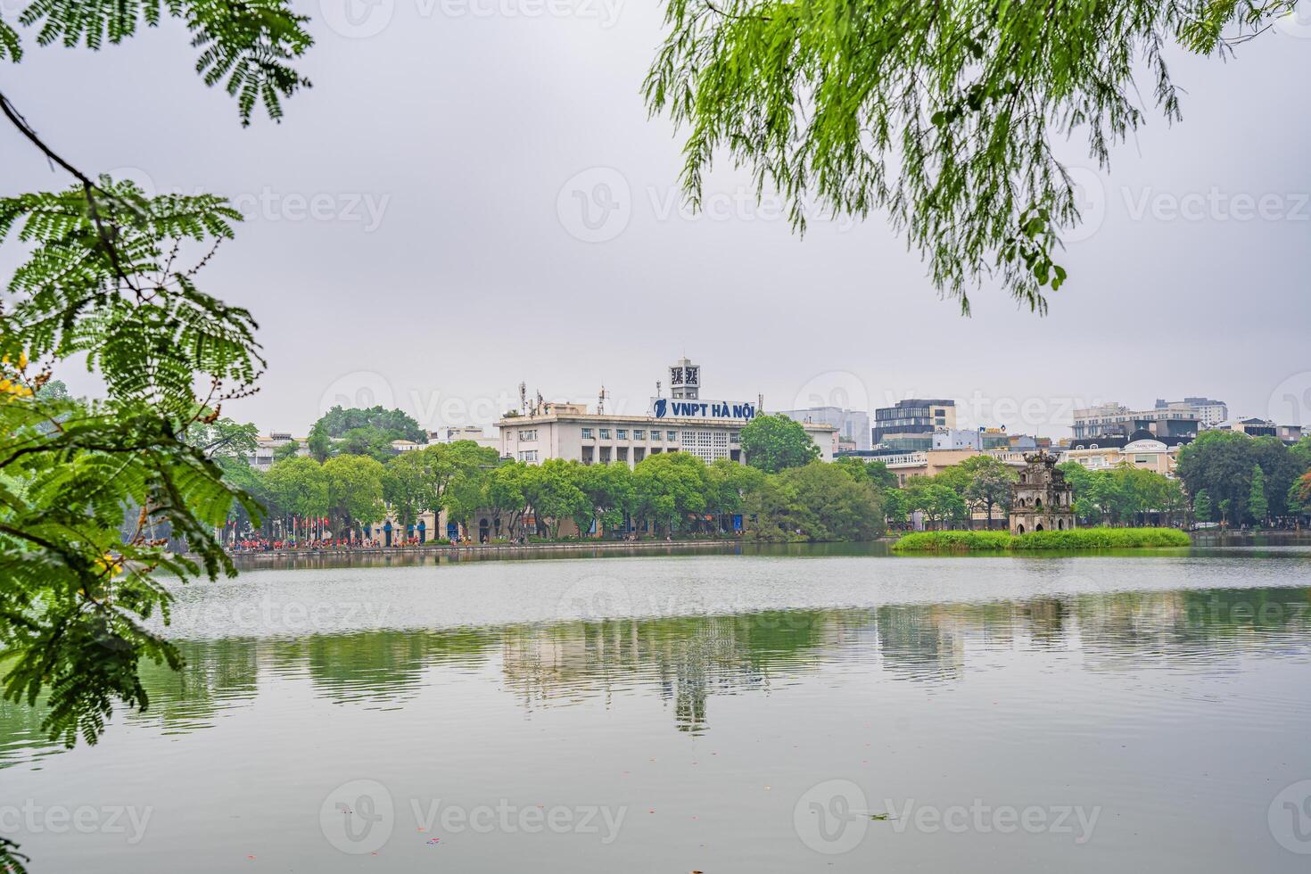 Hanoi, Vietnam - 26 June 2024 Turtle Tower Thap Rua in Hoan Kiem lake Sword lake, Ho Guomn in Hanoi, Vietnam. photo