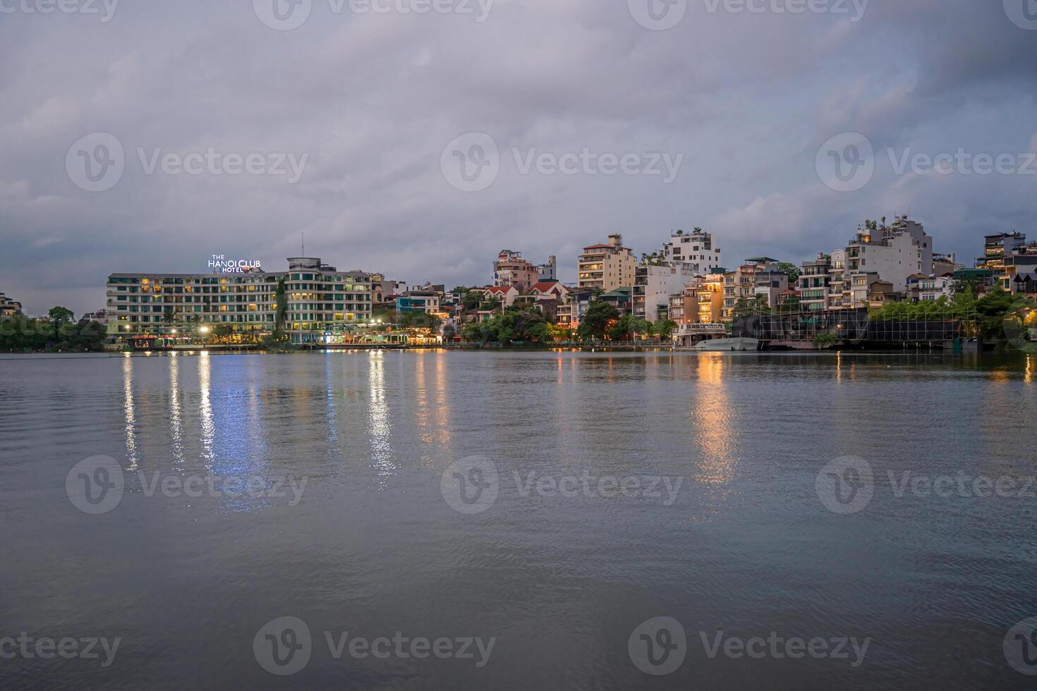 Hanoi, Vietnam - 25 Jun 2024 West Lake in Hanoi in the dark cloudy evening. Ha Noi cityscape. Travel concept photo