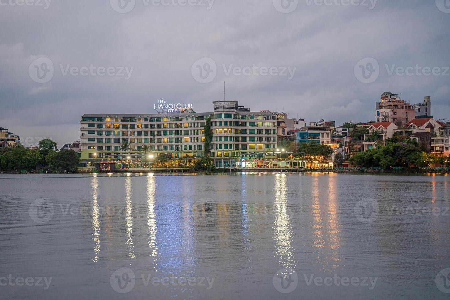 Hanoi, Vietnam - 25 Jun 2024 West Lake in Hanoi in the dark cloudy evening. Ha Noi cityscape. Travel concept photo