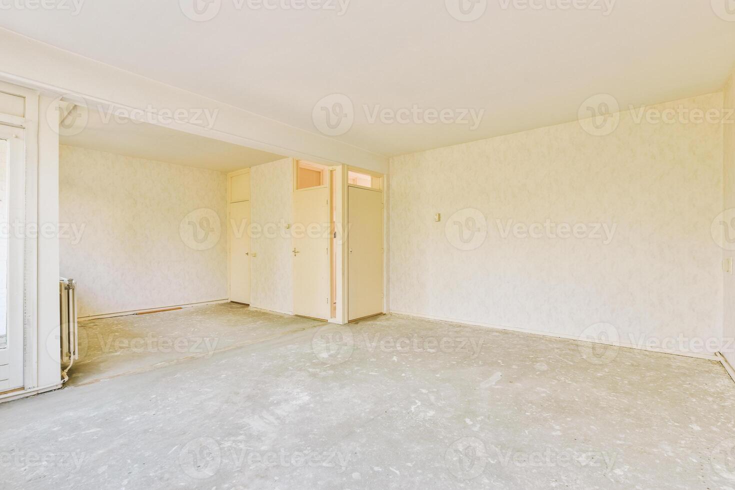 Empty room with white walls and a door photo
