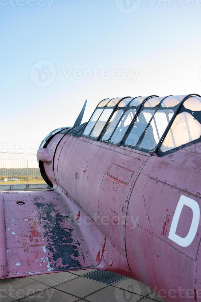 Model of an old airplane side view. Plane. North American AT-6A Texan. photo