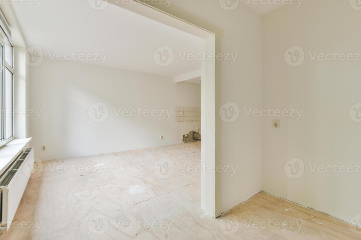 A room with a door and a window photo