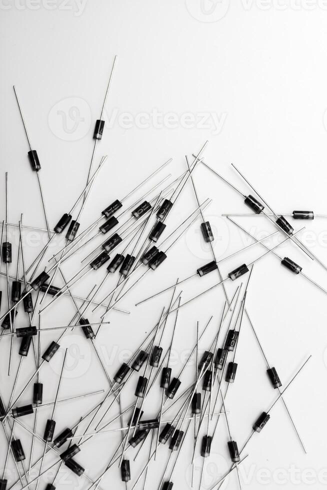 A scattering of radio elements on a white background. Diodes. photo
