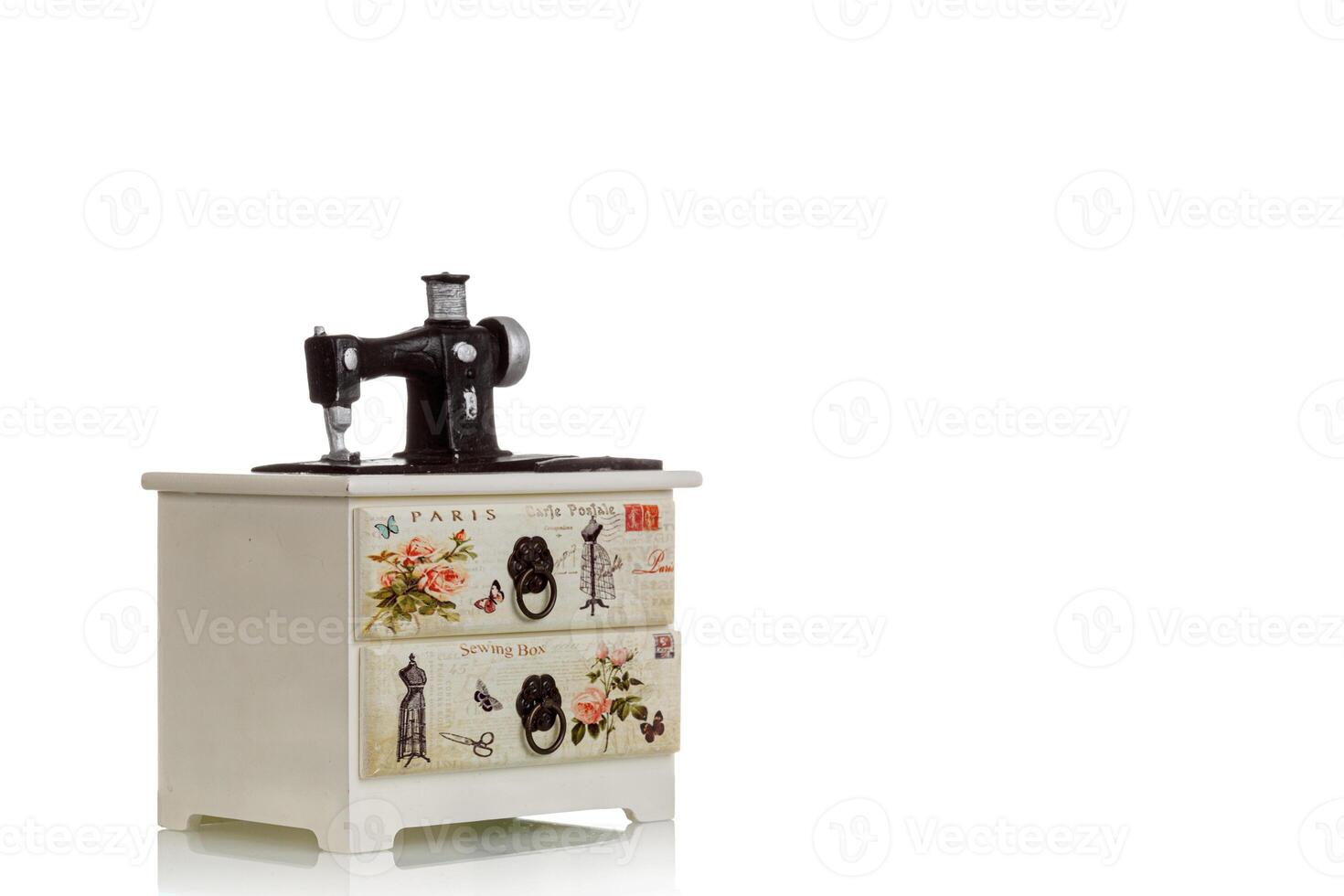 jewelry box with decorative sewing machine on a white background photo
