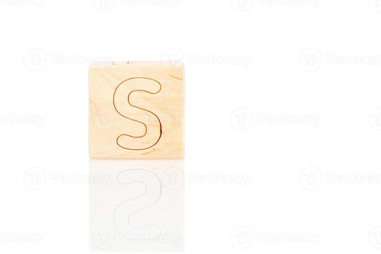 Wooden cubes with letters S on a white background photo