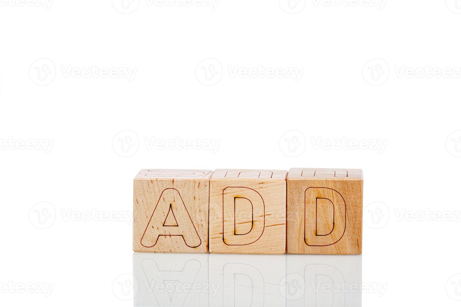 Wooden cubes with letters add on a white background photo