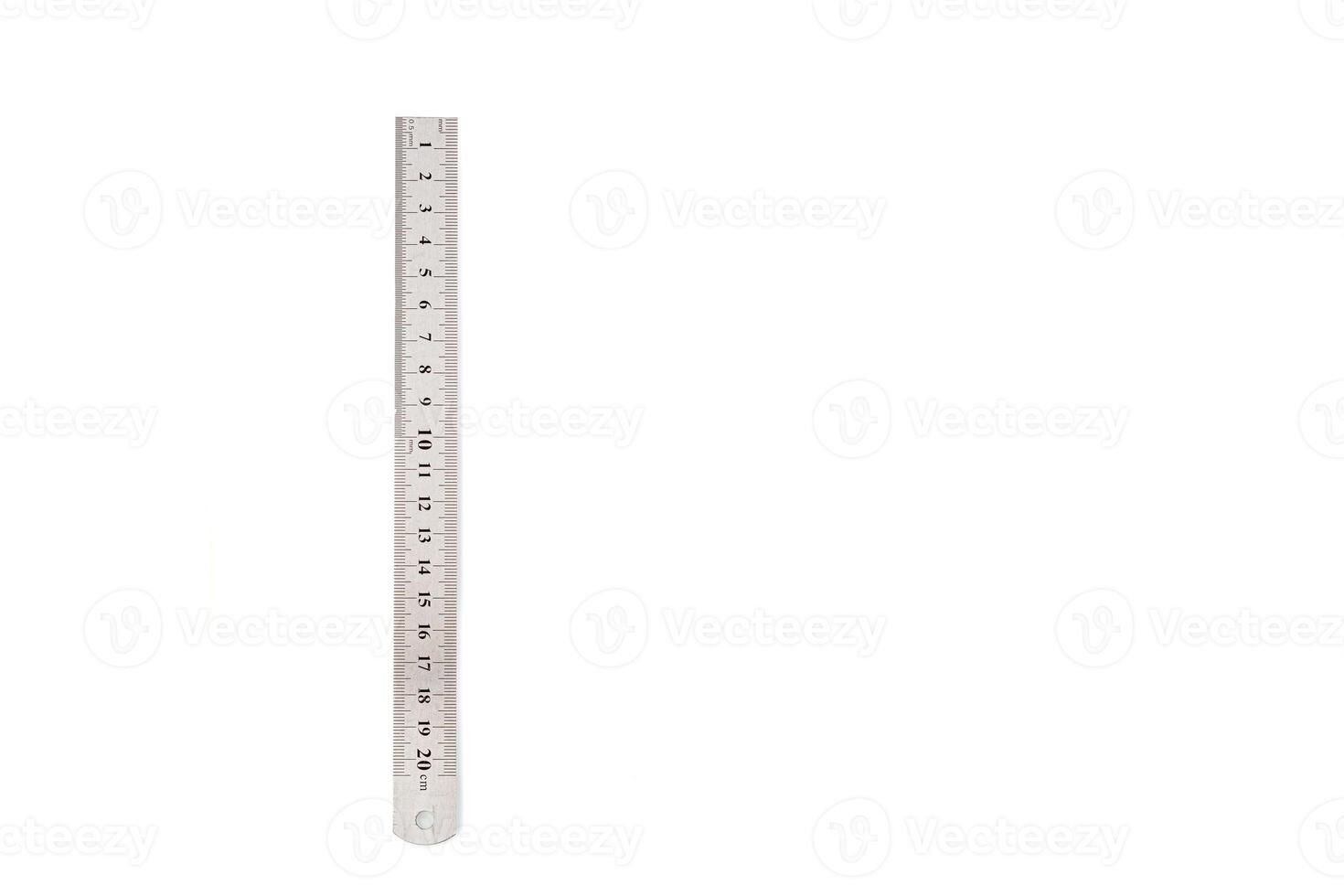 metal ruler isolated on white background photo
