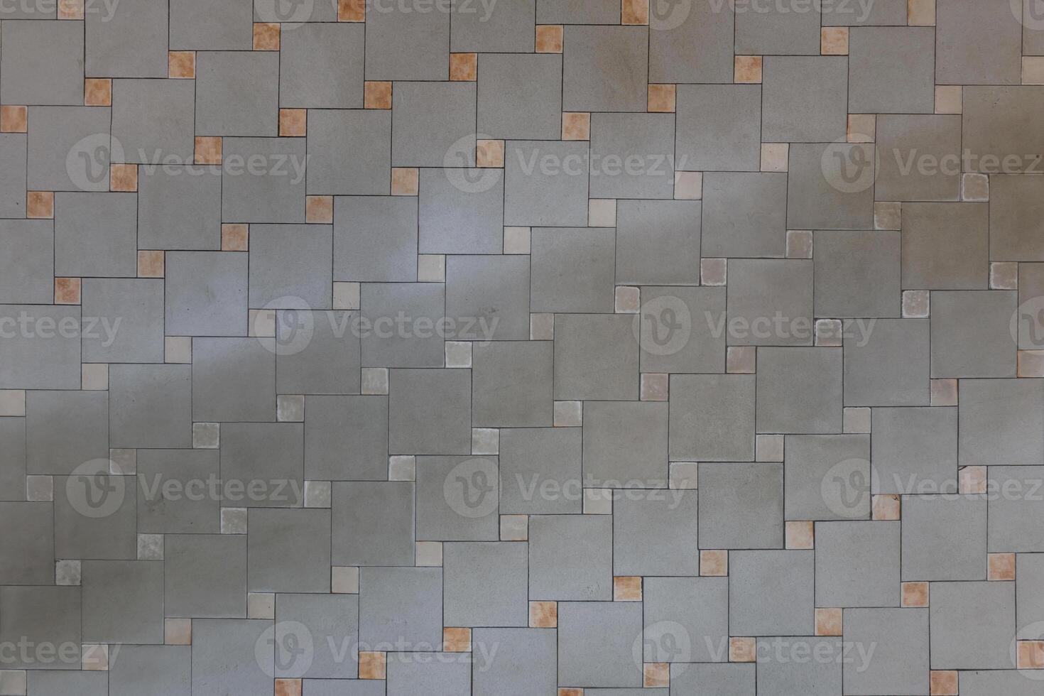 stone and ceramic floor tiles texture in corridor, view from above photo