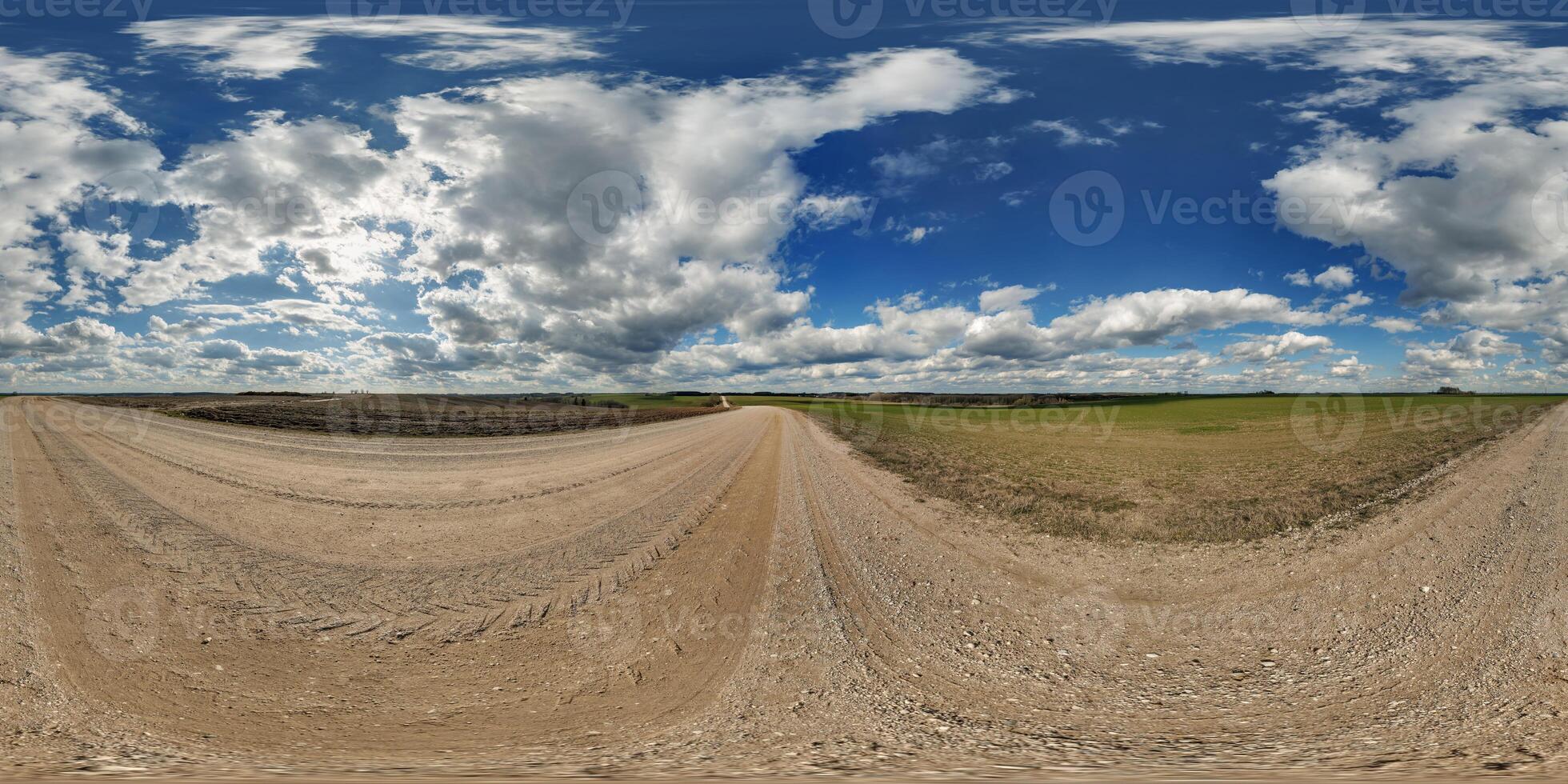 blue sky hdri 360 panorama with awesome clouds on gravel road among fields in spring day in equirectangular full seamless spherical projection, for VR AR content or skydome replacement photo