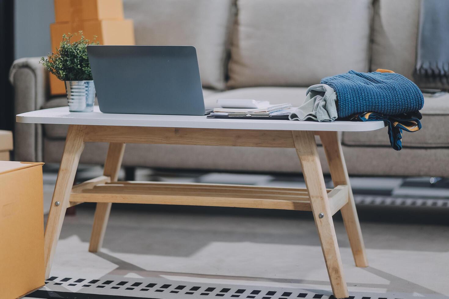 Asian SME business women use laptop computer checking customer order online shipping boxes at home. Starting Small business entrepreneur SME freelance. Online business, Work at home concept. photo