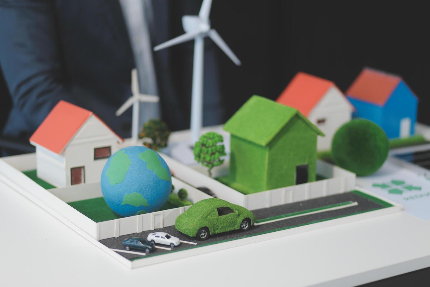 Green energy business company meeting with business people planning and discuss marketing of sustainable and renewable clean energy product with solar cell and wind turbine generator. Trailblazing photo