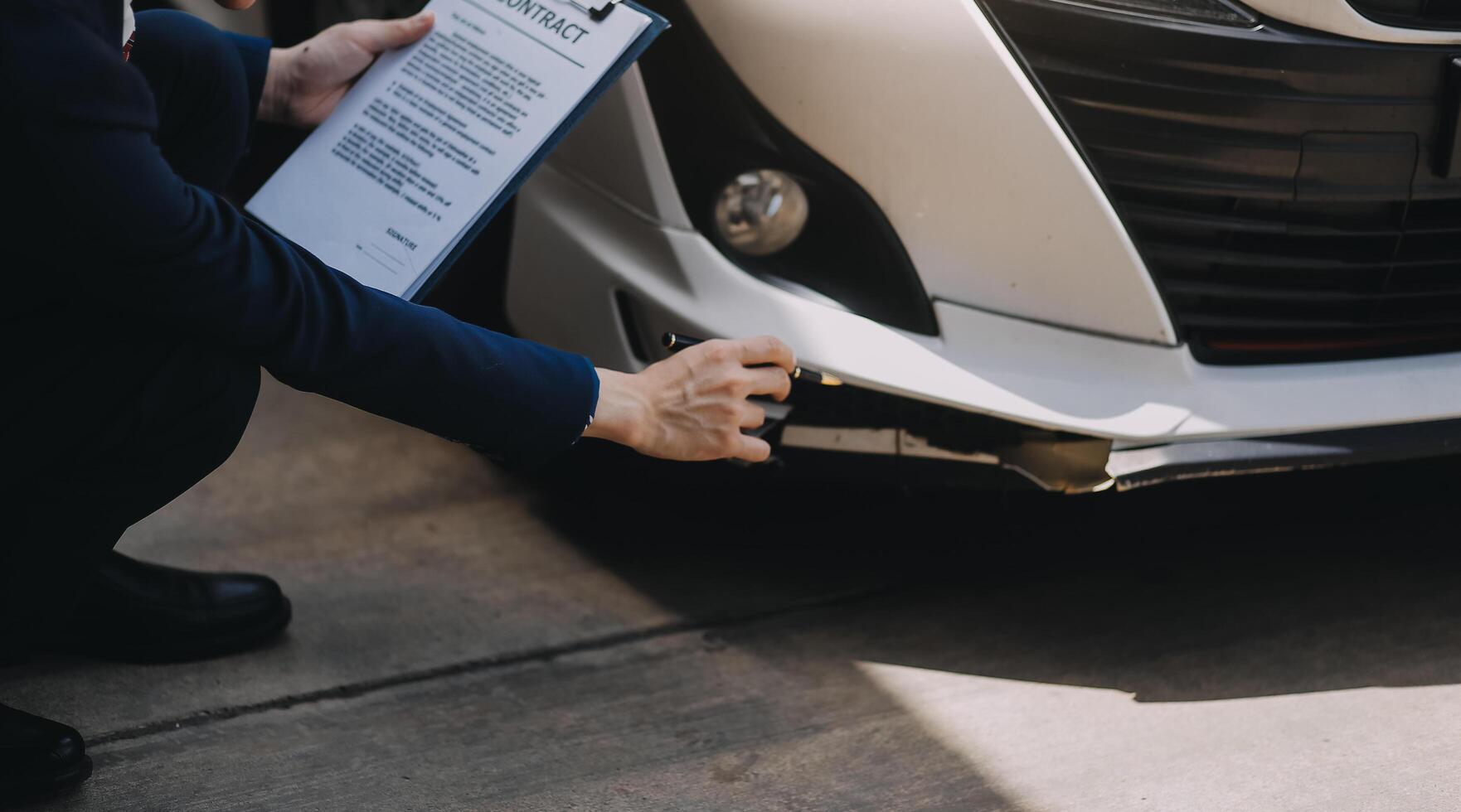 A young businesswoman is navigating car insurance options at her desk, considering premiums, deductibles, and coverage while understanding policies and managing claims efficiently. photo