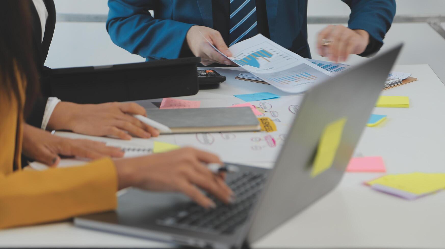 Meeting of business executives discussing analysis of the company's financial situation and business planning with partner collaboration and consultation of strategy. photo