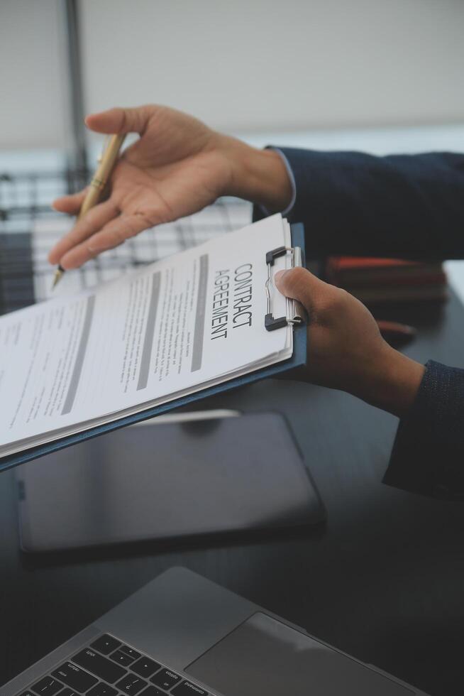 Law theme, gavel or mallet of the judge, lawyer enforcement officers, evidence-based cases taken into account in the court abount business, legislation. photo