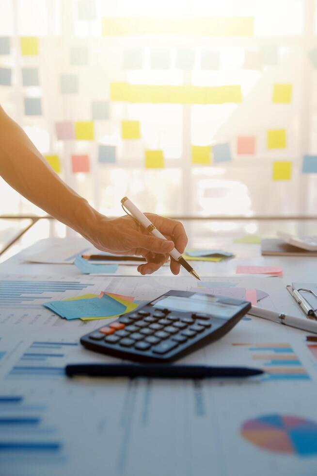 businessman working data document graph chart report marketing research development planning management strategy analysis financial accounting. Business office concept. photo