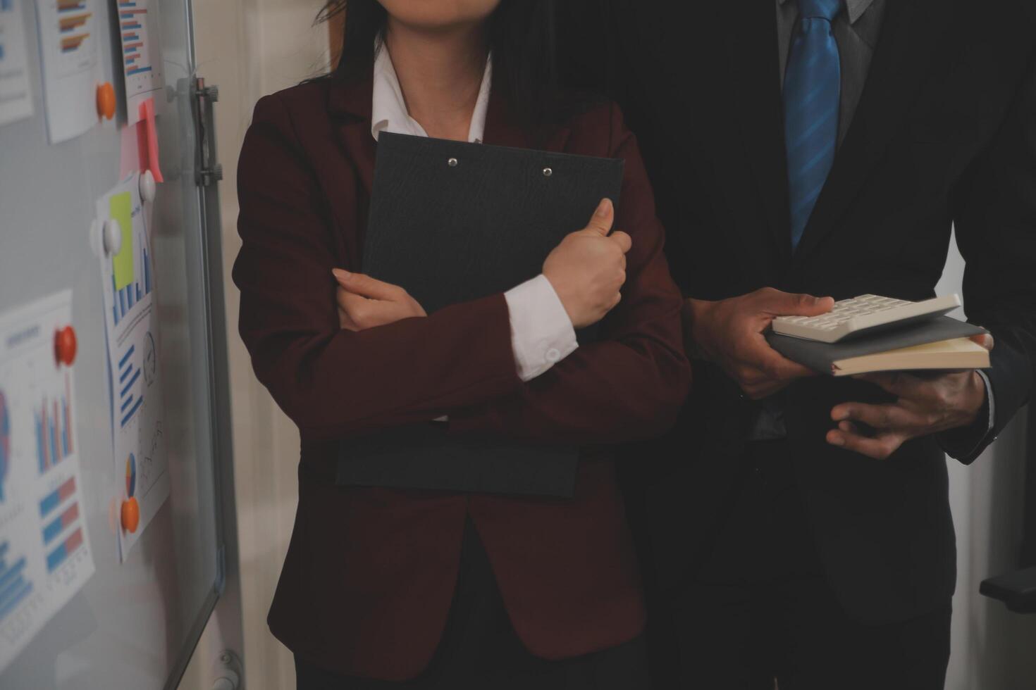 Audit concept,Administrator business man financial inspector and secretary making report calculating balance. Internal Revenue Service checking document. photo