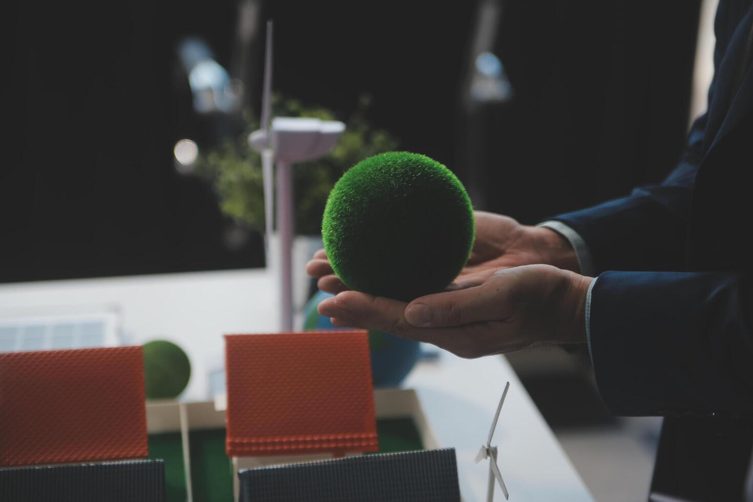 Green energy business company meeting with business people planning and discuss marketing of sustainable and renewable clean energy product with solar cell and wind turbine generator. Trailblazing photo