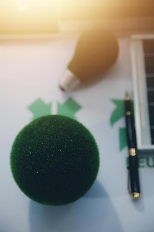 Green energy business company meeting with business people planning and discuss marketing of sustainable and renewable clean energy product with solar cell and wind turbine generator. Trailblazing photo