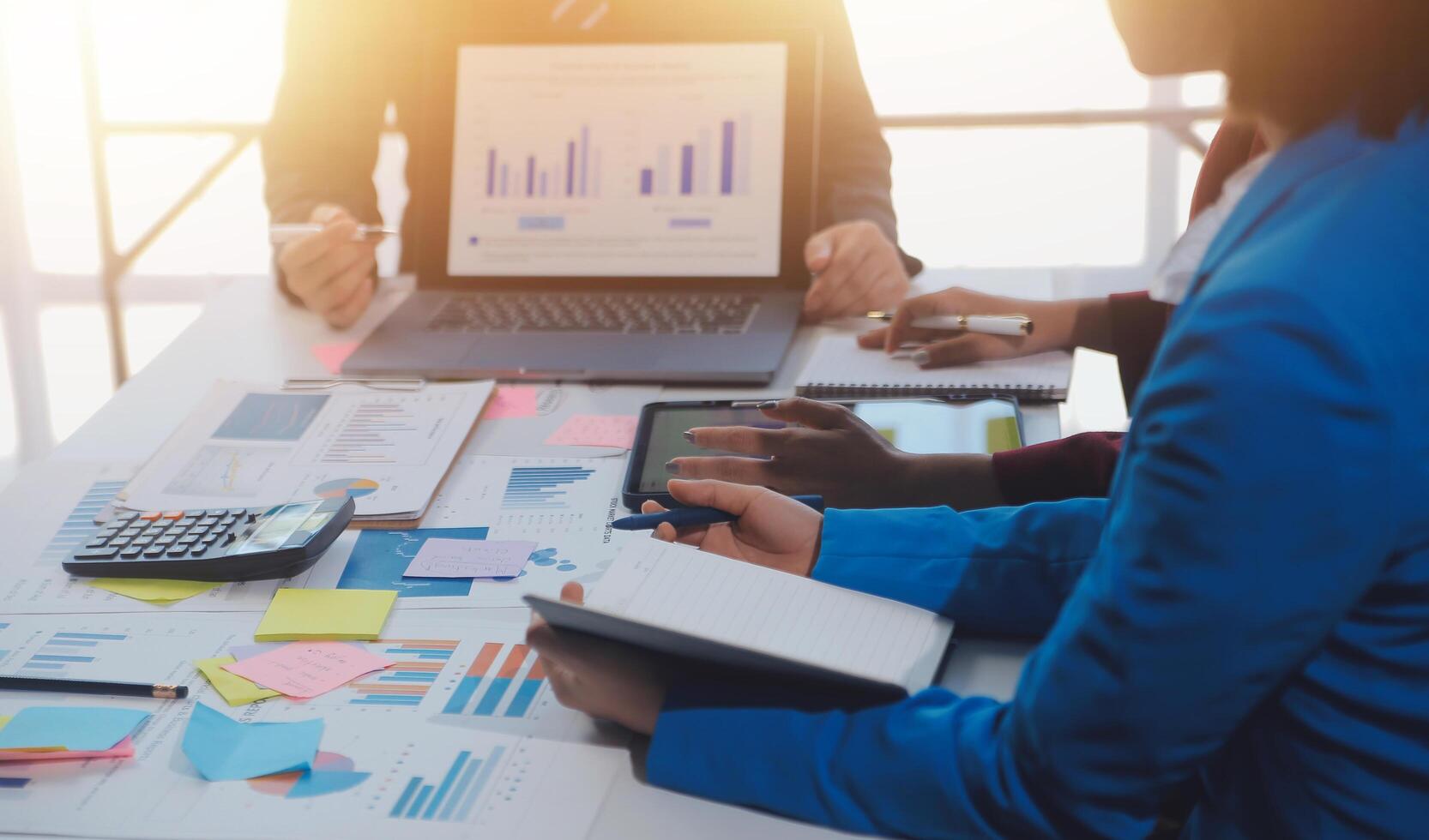 Meeting of business executives discussing analysis of the company's financial situation and business planning with partner collaboration and consultation of strategy. photo