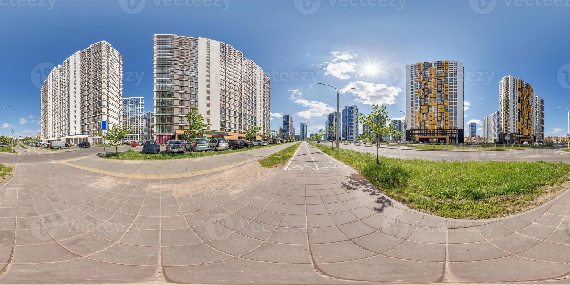hdri 360 panorama near skyscraper multistory buildings of residential quarter complex in full equirectangular seamless spherical projection photo