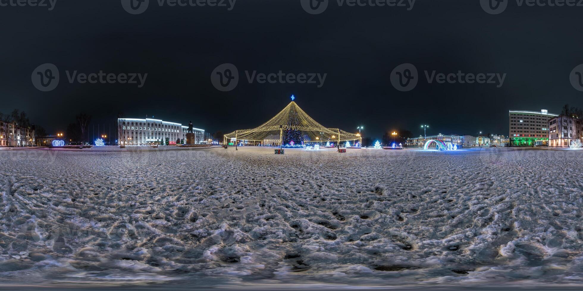 night full 360 panorama on square with Christmas tree with illumination in form of tent on new Year in equirectangular projection with zenith. VR AR content photo
