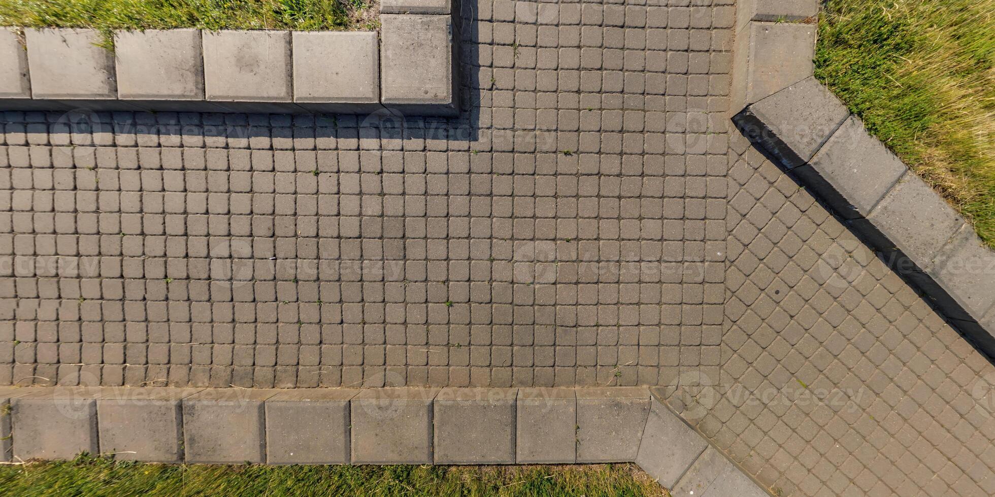 top view of surface of paving slabs and pedestrian footpath photo