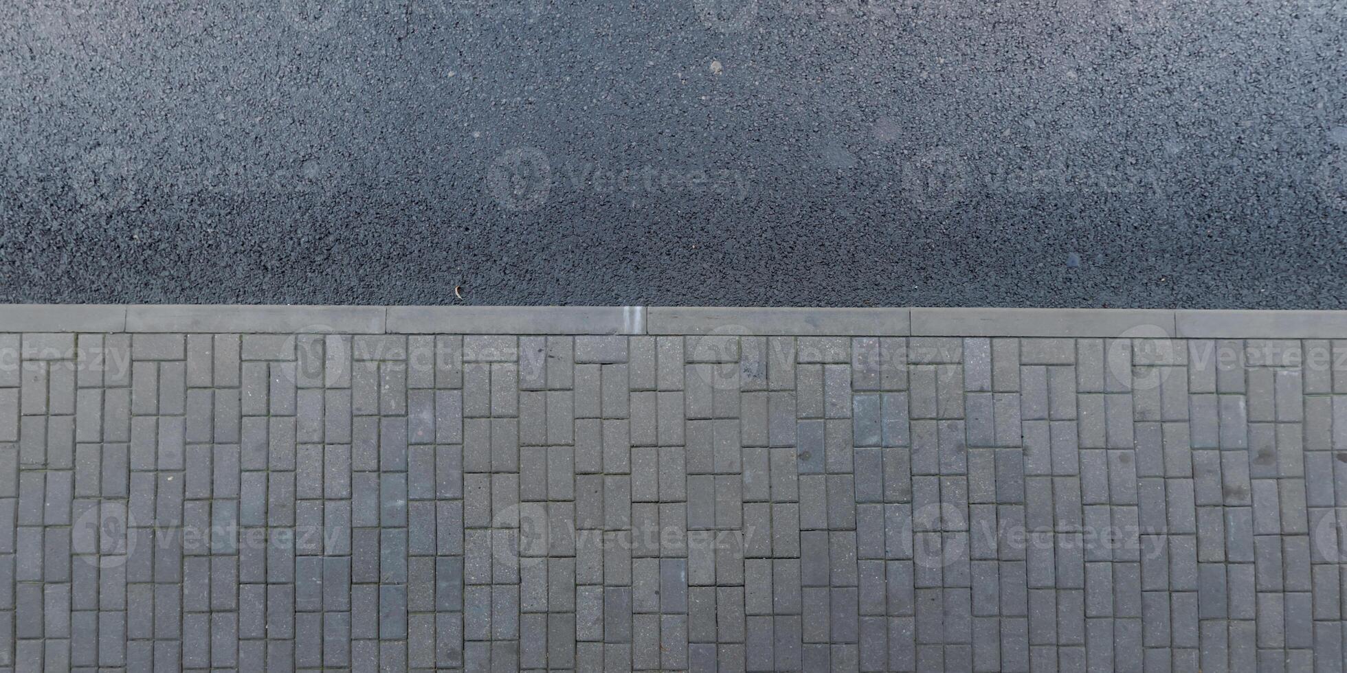 top view of surface of paving slabs and pedestrian footpath photo