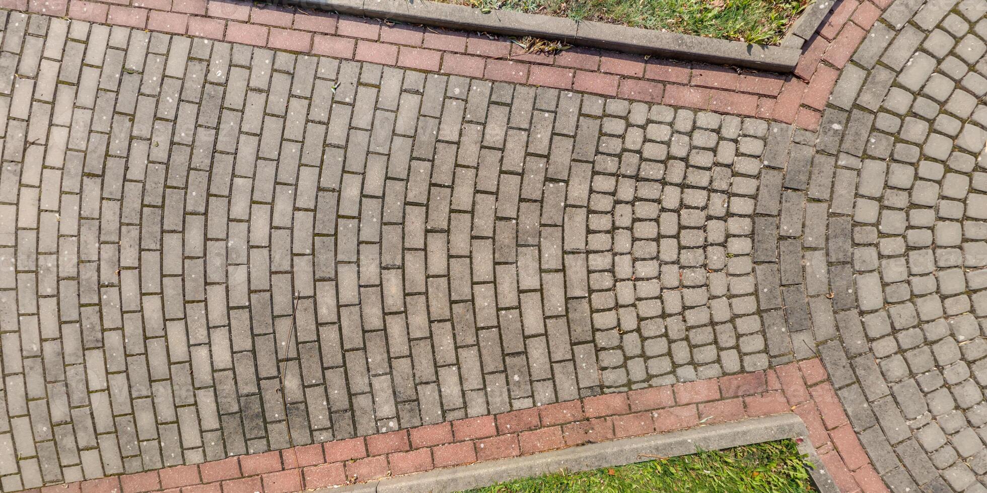 top view of surface of paving slabs and pedestrian footpath photo