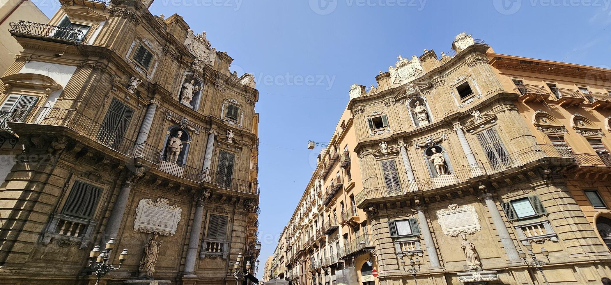 The Quattro Canti, or Piazza Villena, or Octagon of the Sun, or Teatro del Sole, is the name of an octagonal square at the intersection of the two main roads of Palermo Via Maqueda and the Cassaro photo