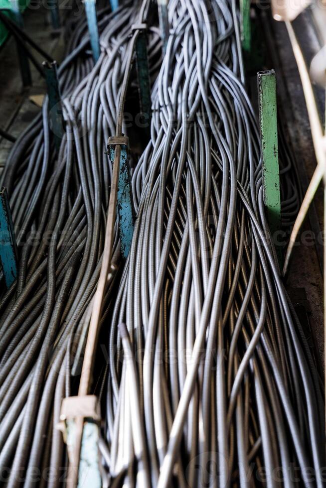 Products of a metallurgical enterprise, a bundle of wire springs, a warehouse for storing metal products. photo