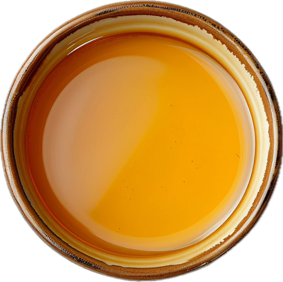 Top view of honey in a bowl. png