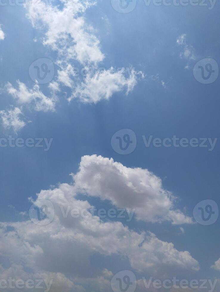a person flying a kite in the sky photo