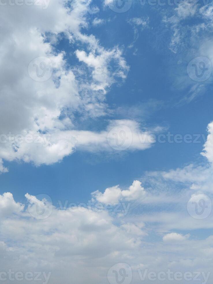 a person is flying a kite in the sky photo