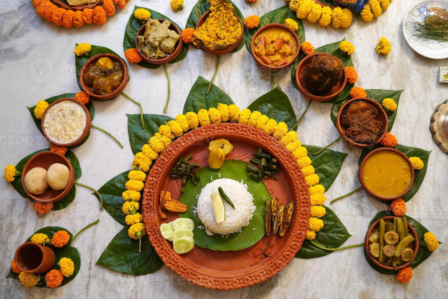 Special Bengali food for Special occasion served in earthenware photo