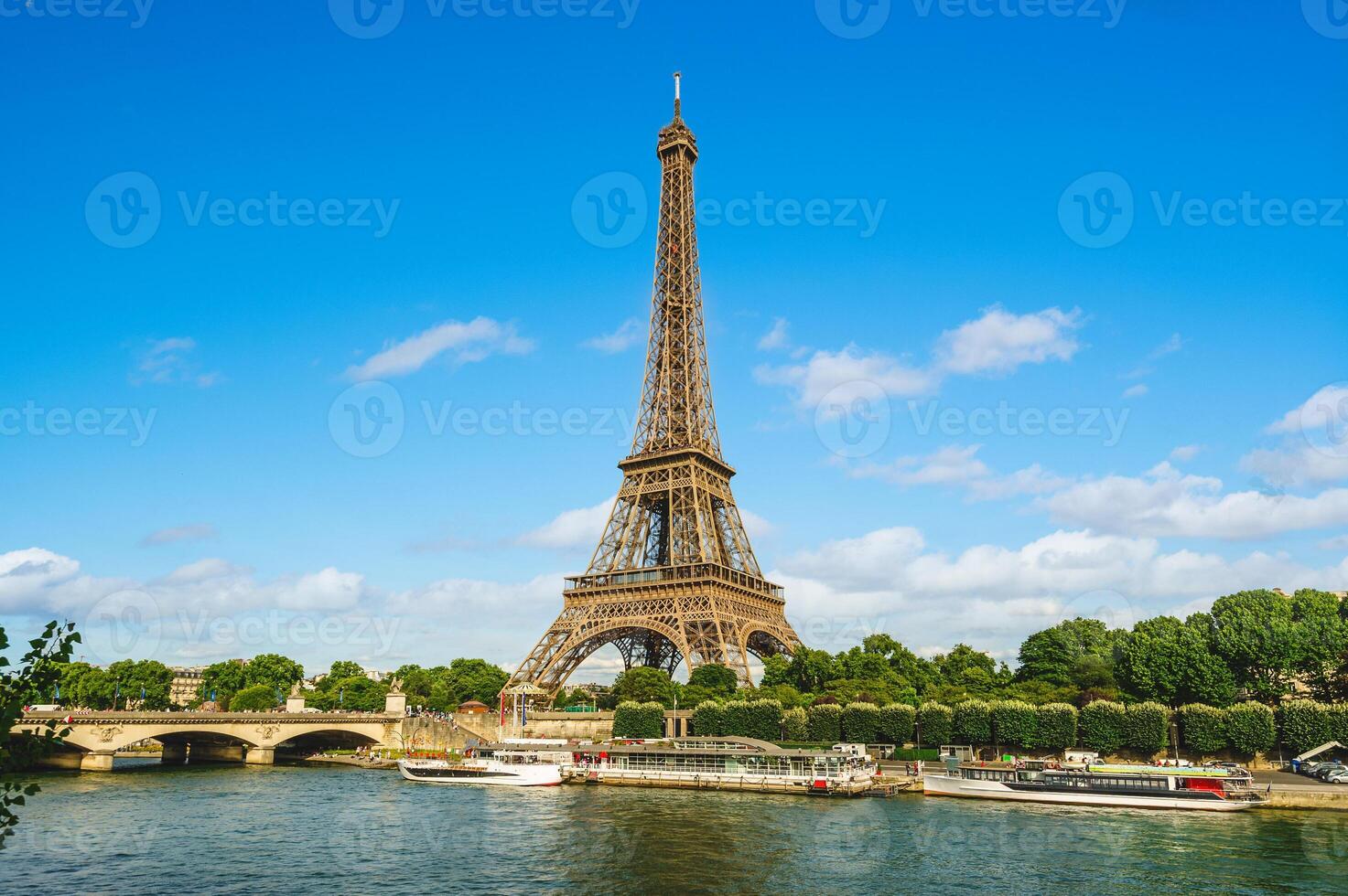 Eiffel Tower at the left bank of Seine river in Paris, France photo