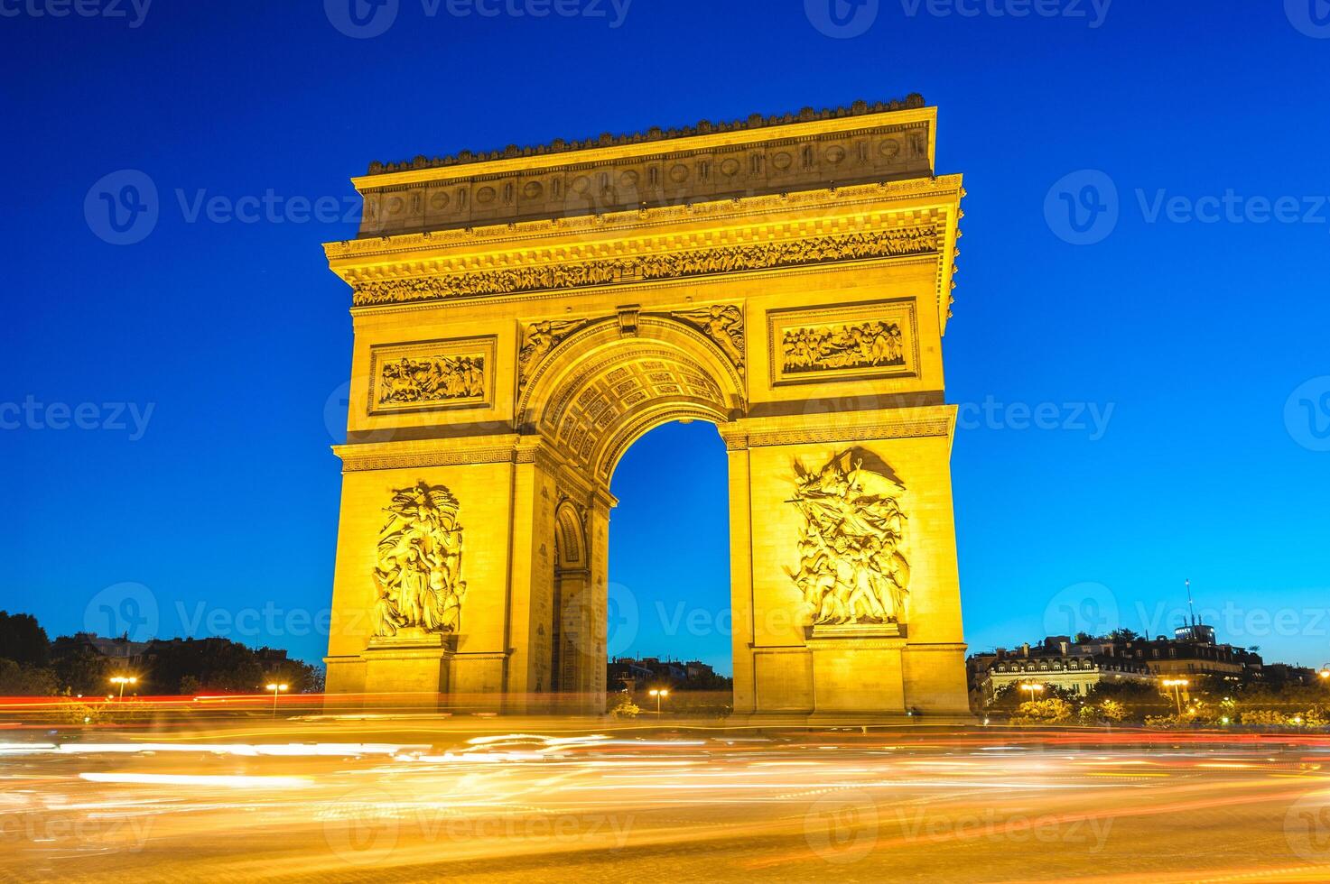 Night scene of Arc de Triomphe, the most famous monuments in Paris, France photo