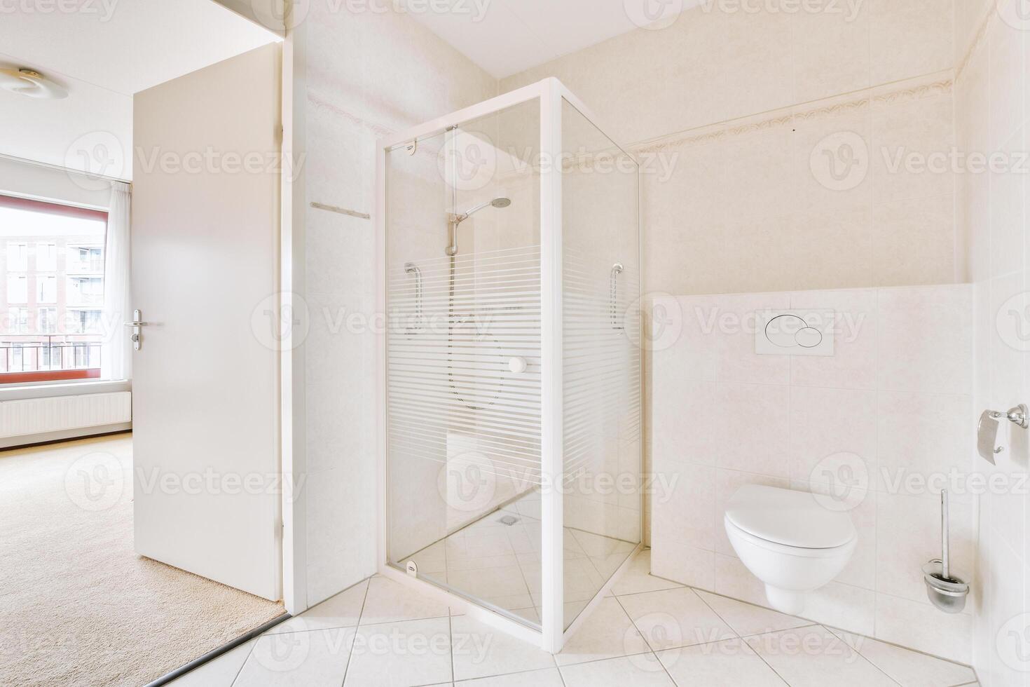 A bathroom with a shower and a toilet photo