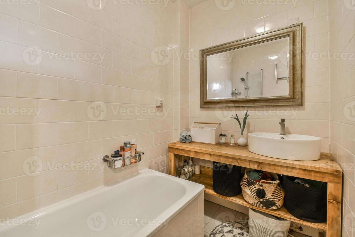 A bathroom with a sink, toilet and mirror photo