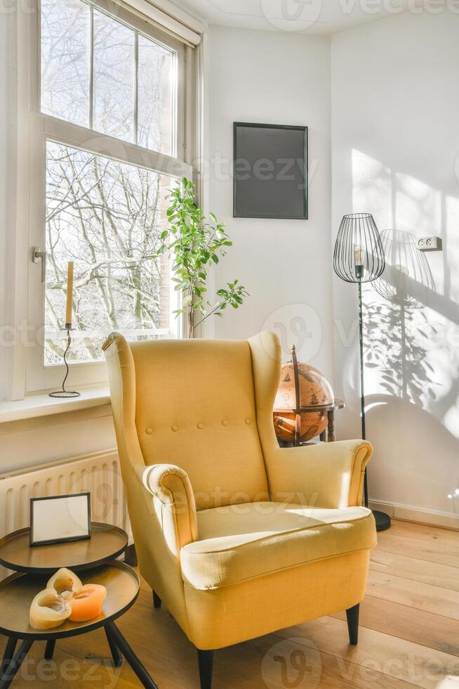 A yellow chair in a room photo
