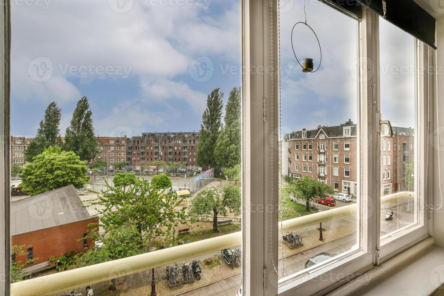 A window with a white frame photo