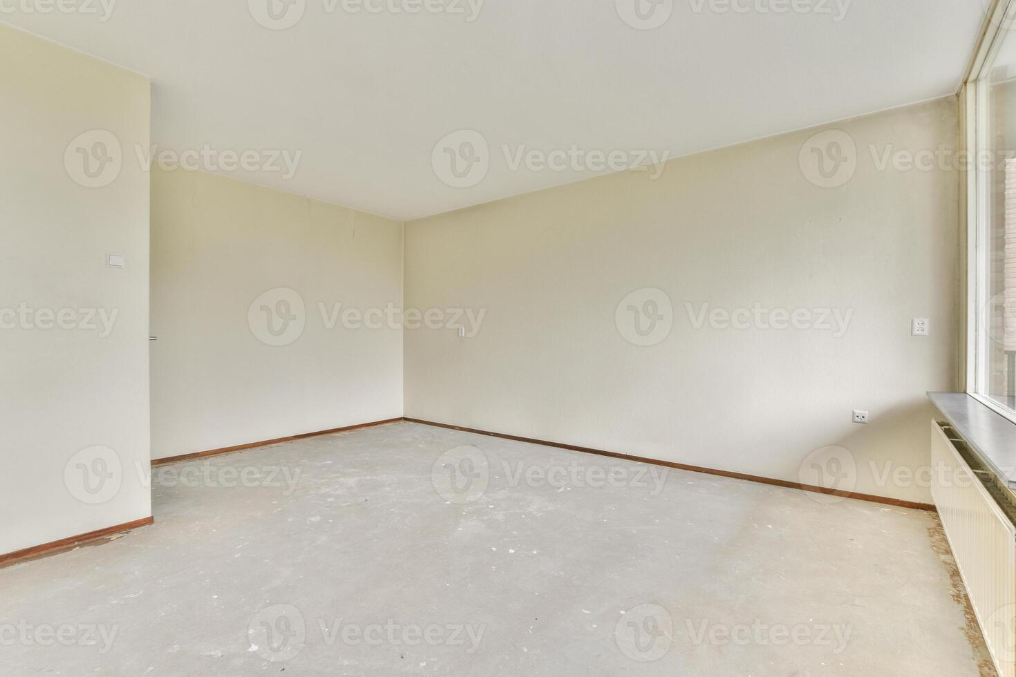 Empty room with a window and a door photo
