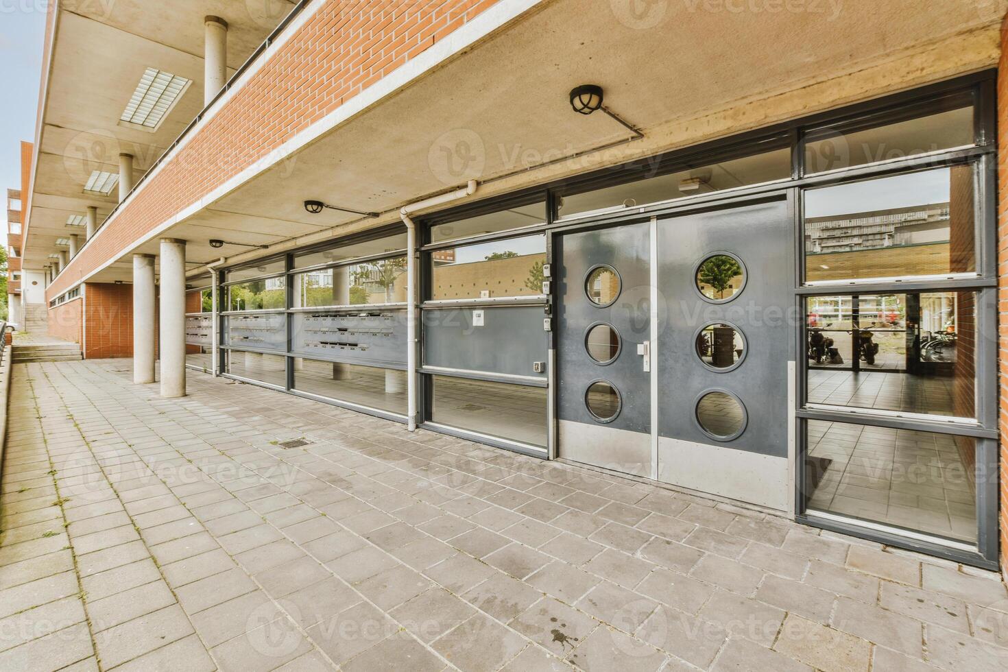 A building with a large glass door photo