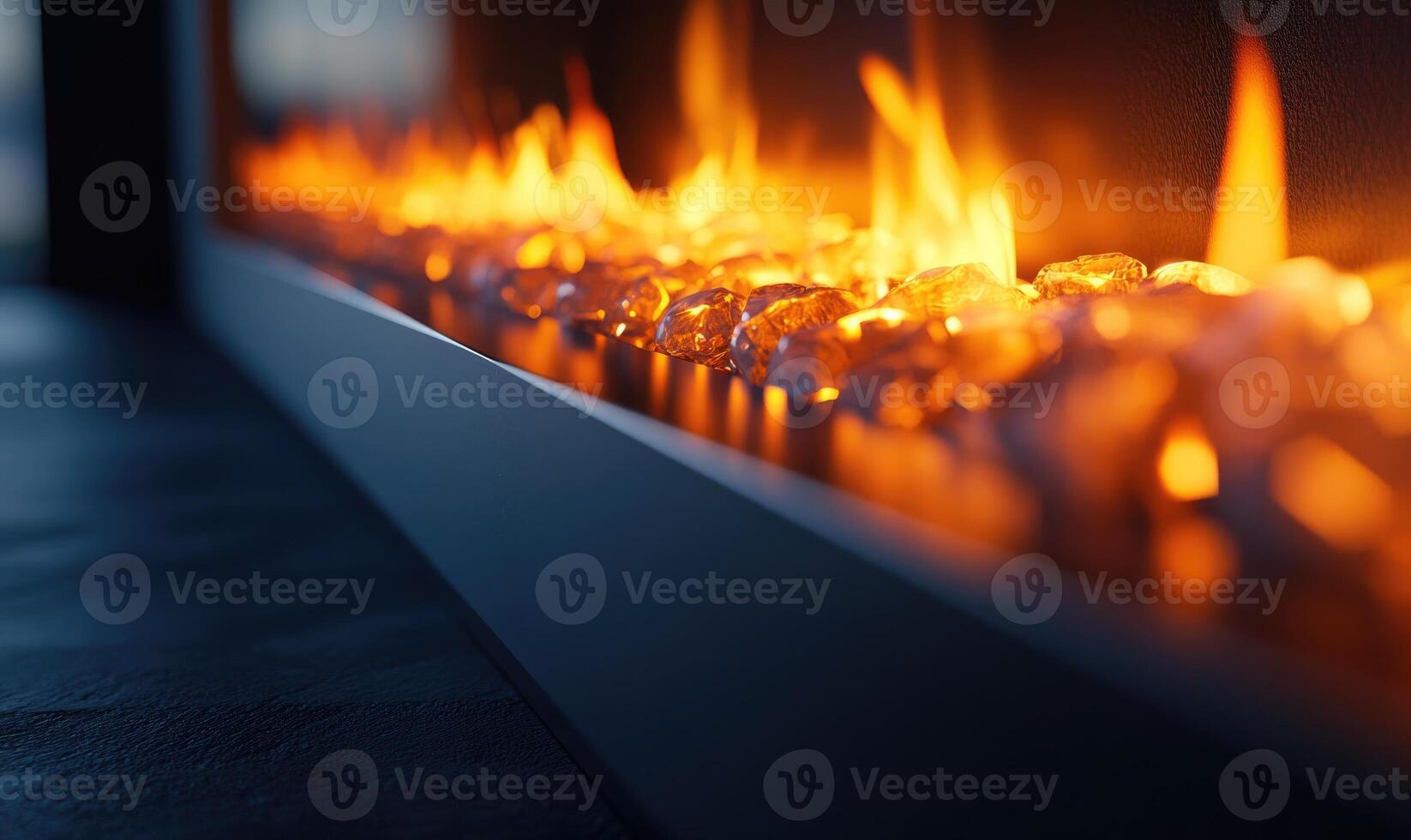 Close-up of fire in a sleek modern fireplace, glowing embers photo